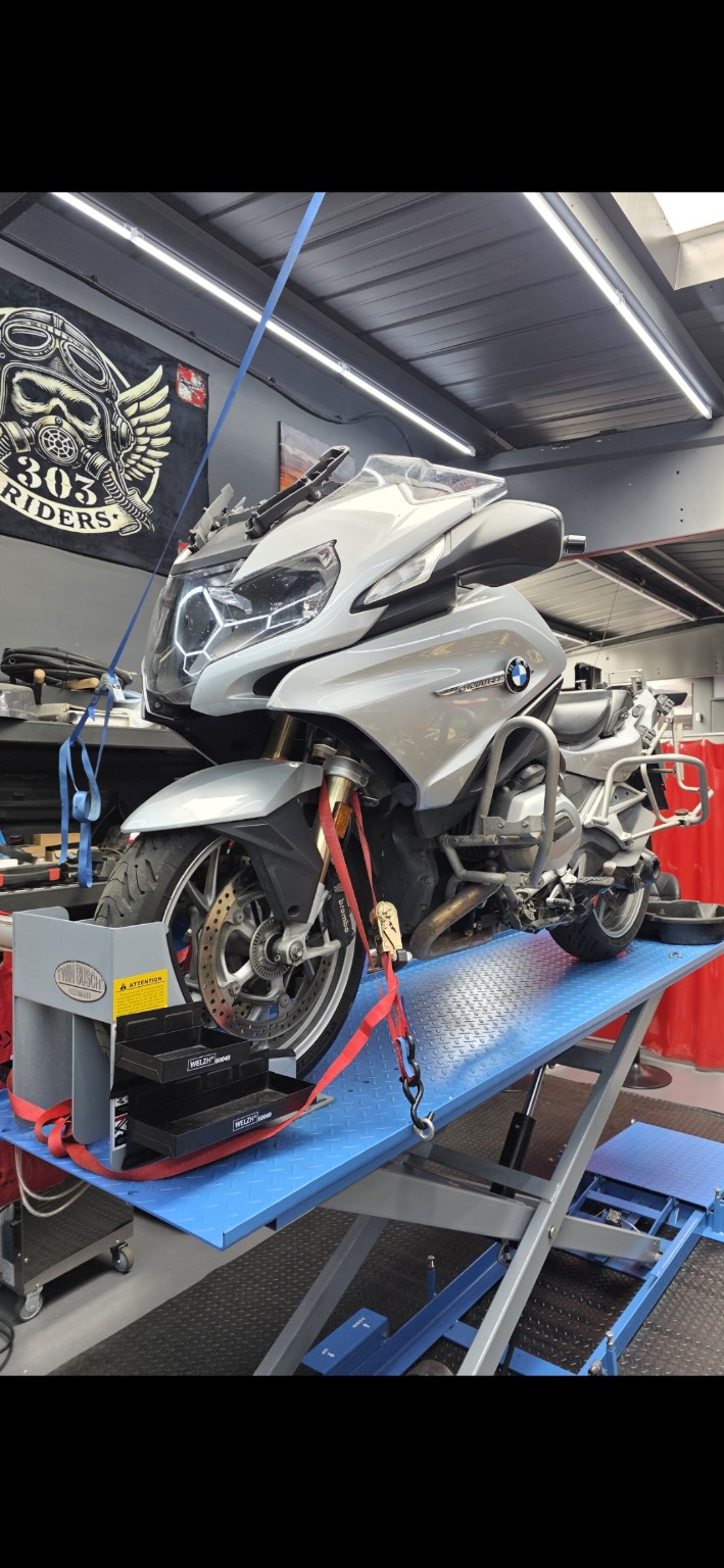 BMW touring motorcycle in the AUTO 7 CENTRE workshop