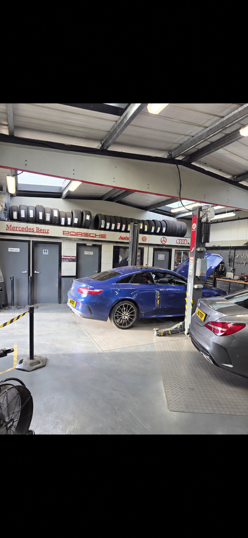Mercedes-Benz being serviced inside AUTO 7 CENTRE